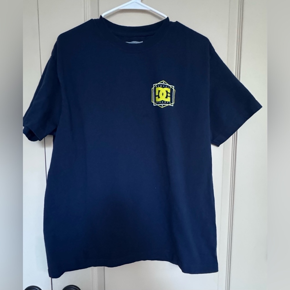 vintage-style Shoes graphic T-shirt featuring a logo with "MCMXCIV" (1994)